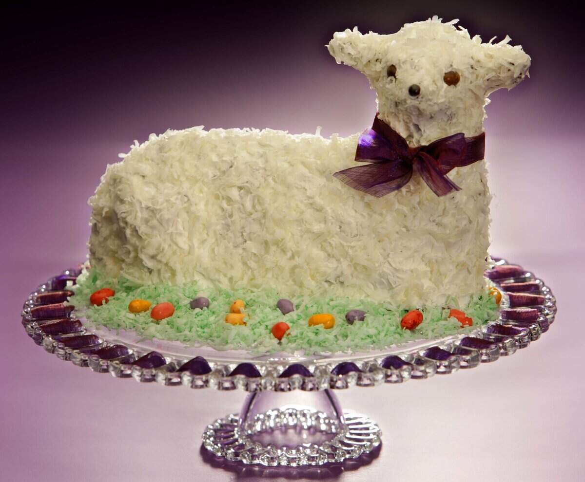 A coconut-covered chocolate lamb cake creates a festive finale for the Easter dinner.