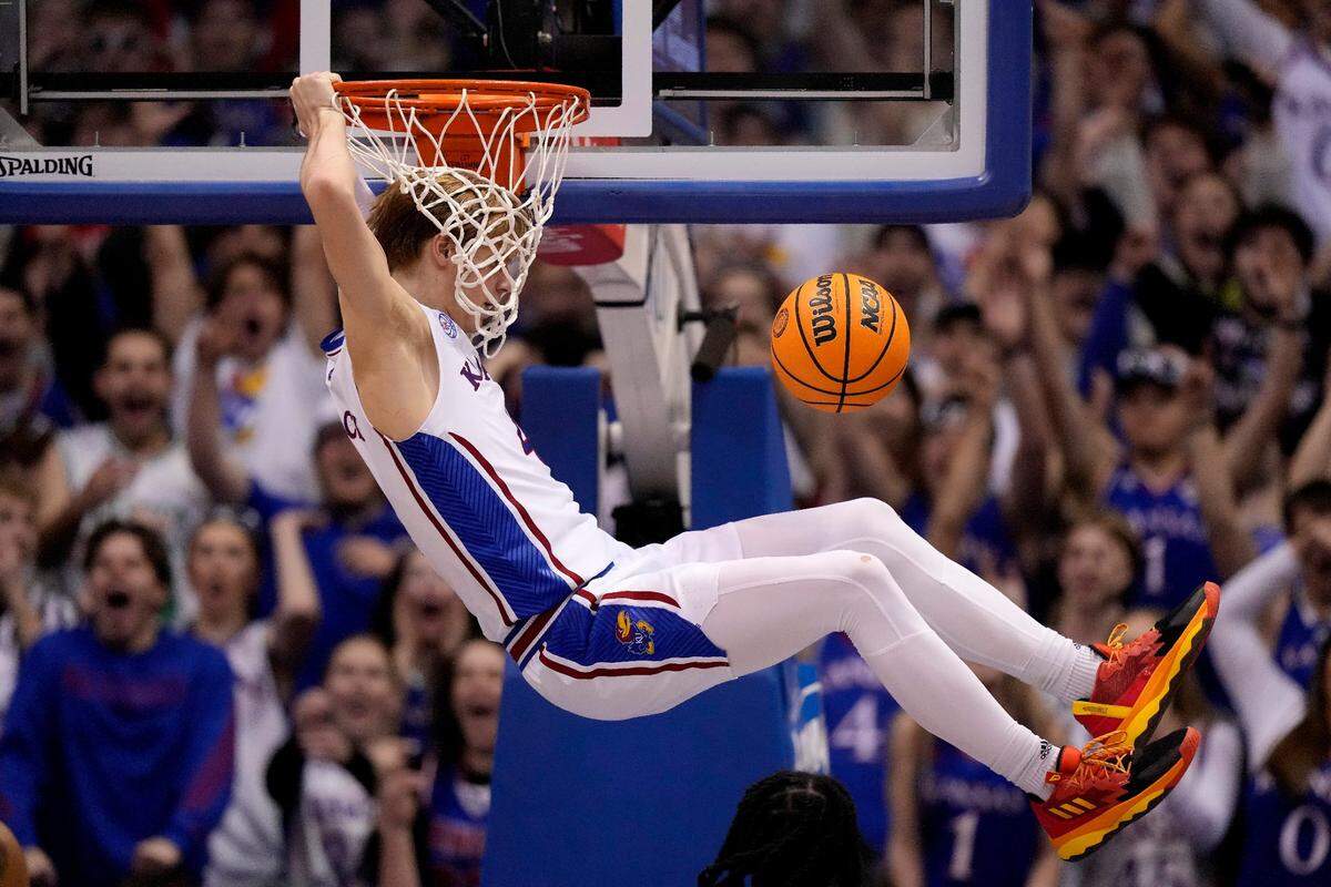 Kansas guard Gradey Dick dunks the ball during the second half of an 88-80 win over Texas Monday, Feb. 6, 2023, at Allen Fieldhouse.
