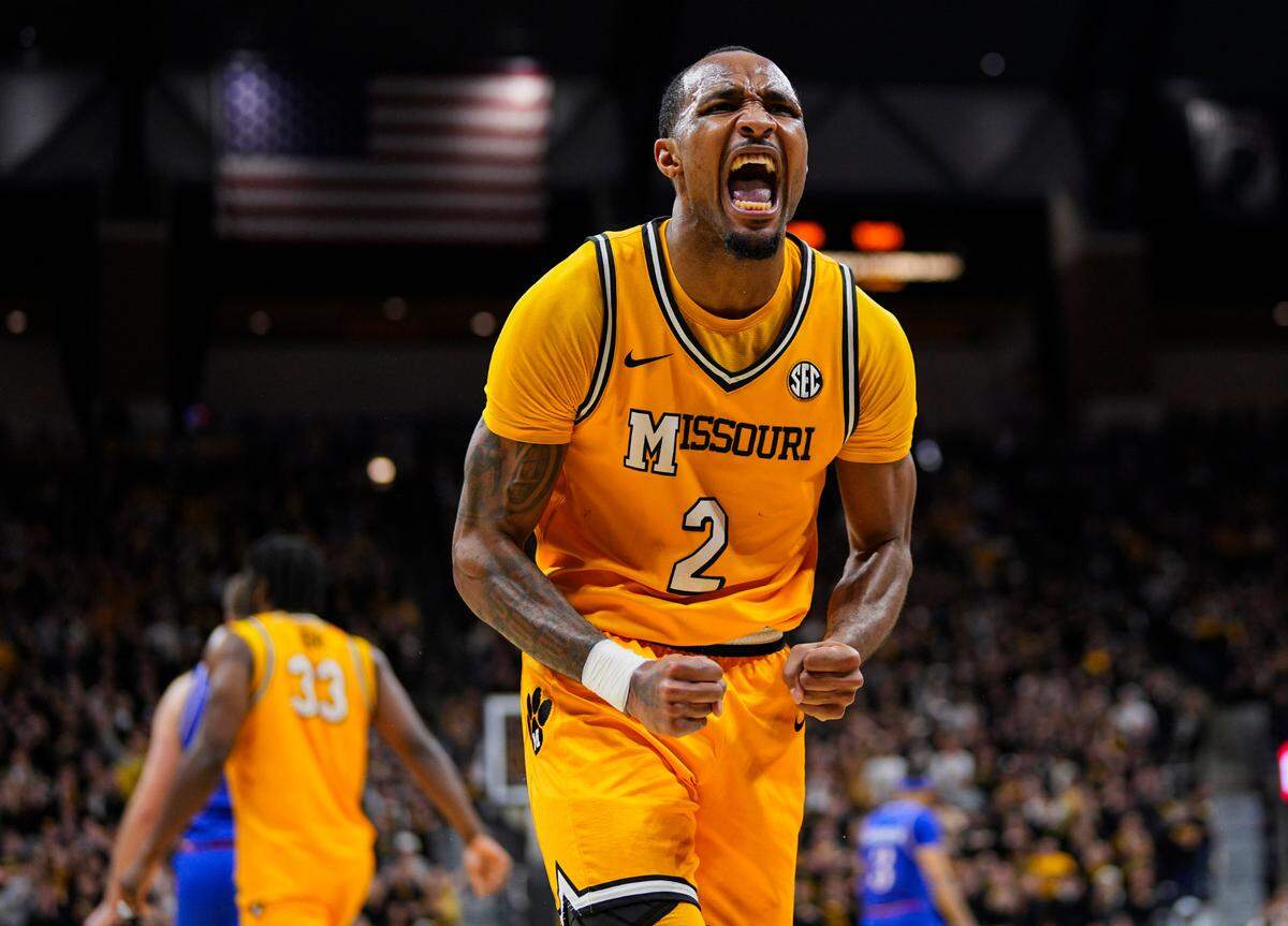 Missouri Tigers guard Tamar Bates (2) celebrates after a play against the Kansas Jayhawks during the first half at Mizzou Arena on Dec. 8, 2024.