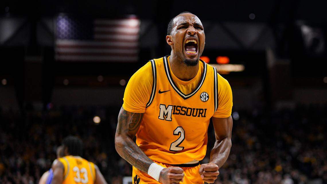 Missouri Tigers guard Tamar Bates (2) celebrates after a play against the Kansas Jayhawks during the first half at Mizzou Arena on Dec. 8, 2024.