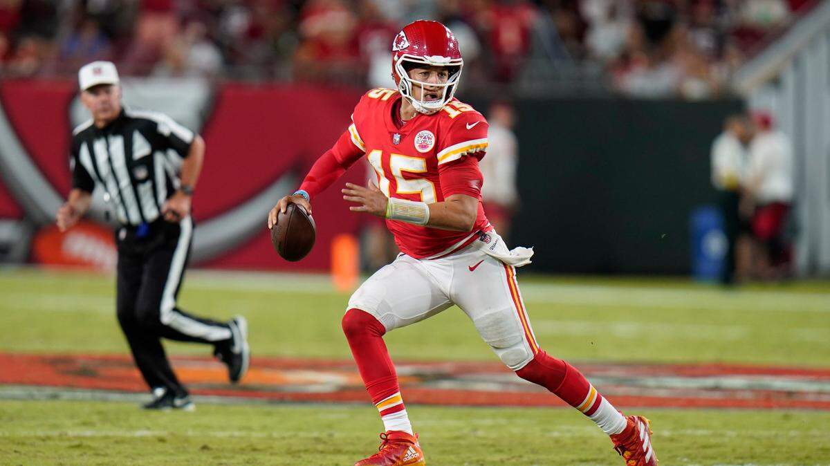 Kansas City Chiefs quarterback Patrick Mahomes (15) scrambles during the second half of an NFL football game against the Tampa Bay Buccaneers Sunday, Oct. 2, 2022, in Tampa, Fla.