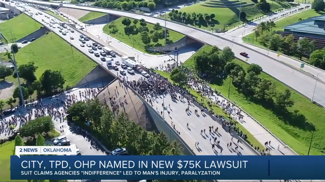 A man who says his fall from an overpass at a Black Lives Matter rally in Tulsa led to paralysis has filed a lawsuit against a couple agencies.