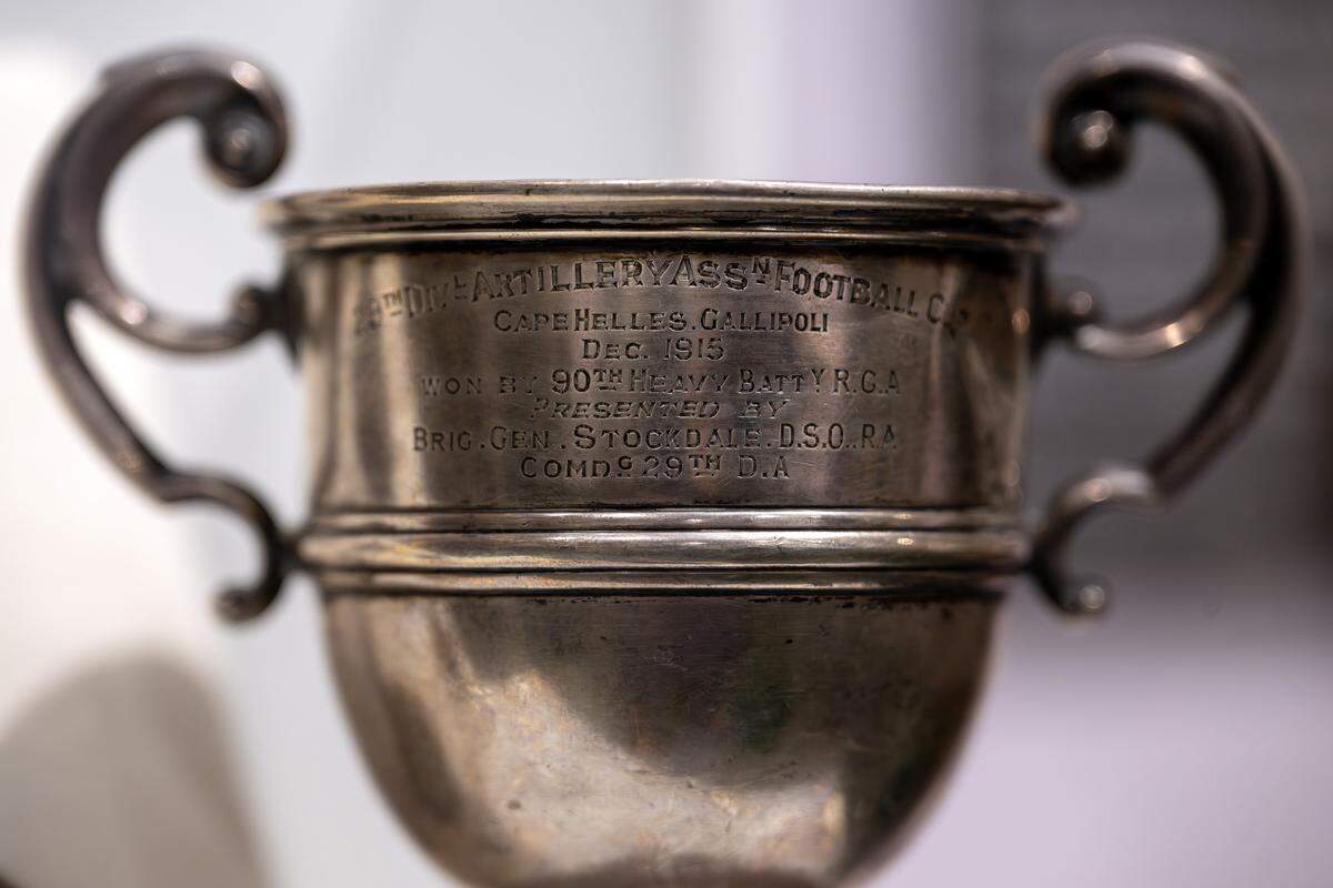 A football cup from the 29th Division Artillery Association, is displayed in the new exhibition “The Beautiful Game,” highlighting the role of soccer during World War I, at the National WWI Museum and Memorial on Wednesday, April 1, 2026, in Kansas City.