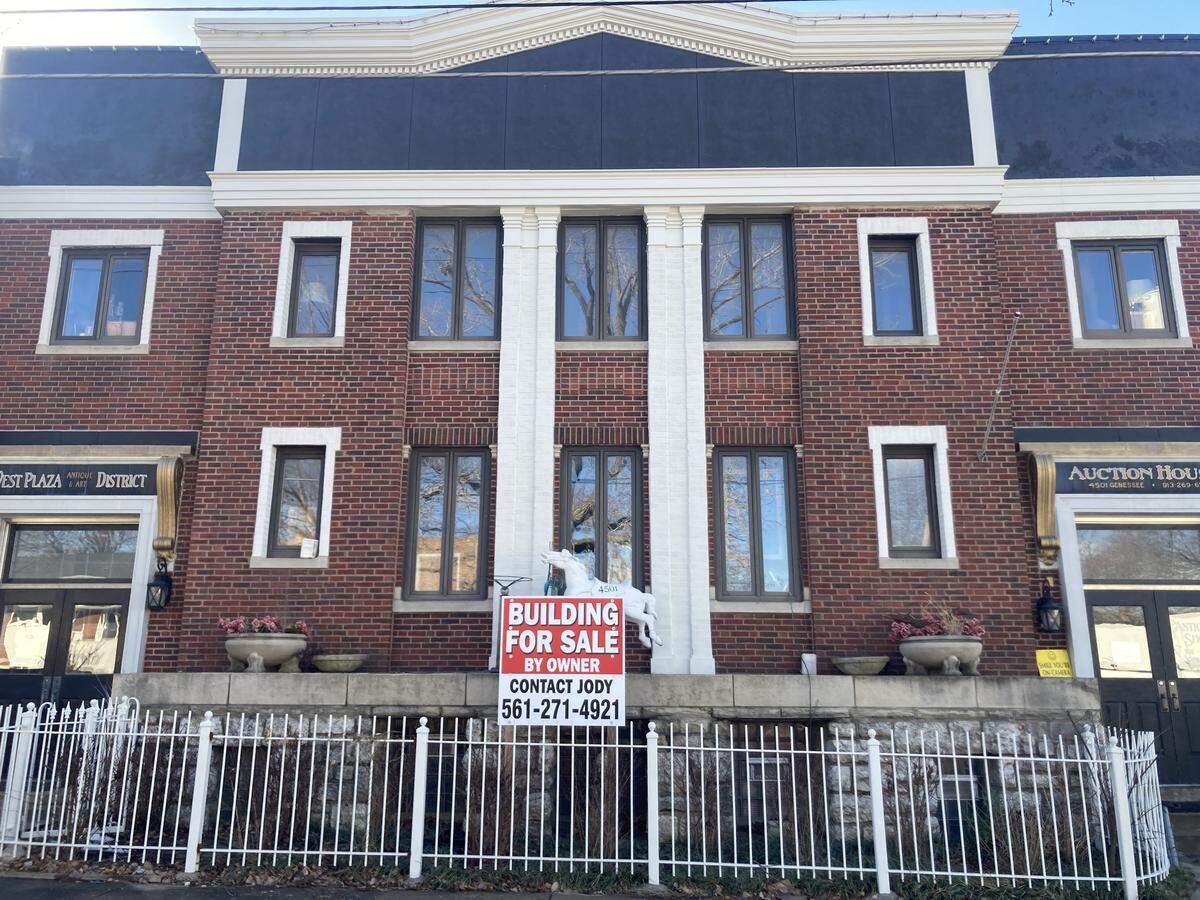 Antiques building at 4501 Genessee St. now up for sale in the West Plaza.