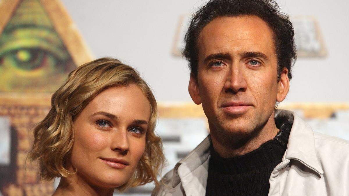American actor Nicolas Cage and Diane Kruger pose during a media promotion for their new film “National Treasure” Wednesday, Dec. 15, 2004 in Taipei, Taiwan. “National Treasure,” about a race to find a fortune hidden by the signers of the Declaration of Independence, was the top movie for a third straight weekend with $17.1 million in ticket sales, according to studio estimates Sunday. (AP Photo/Wally Santana)