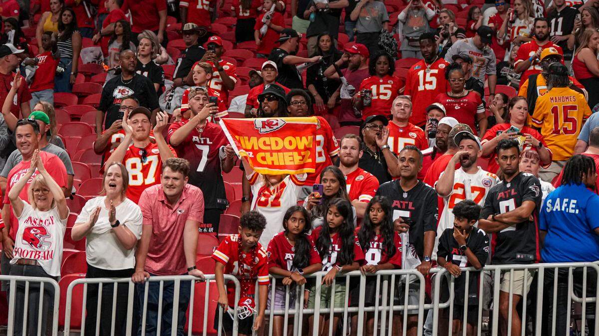 Kansas City Chiefs fans react after the Chiefs defeated the Atlanta Falcons at Mercedes-Benz Stadium in September.