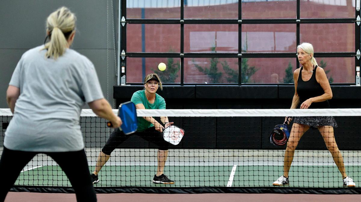 Regulars at Chicken N Pickle in North Kansas City, Janet Knapp and Robyn Pence teamed up for a game in 2020.