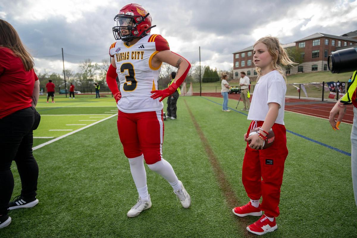 KC Glory linebacker Nana Olavuo (3), reached out to Eleana Easley, an 8-year-old from Cambridge, Minnesota, and invited her to the home opener for the city’s semi-professional women’s full-contact tackle football team, on Saturday, March 29, 2025, at the Pembroke Hill School in Kansas City. Olavuo contacted Elena after a TikTok video of Elena went viral after a boy at her school told her girls don’t play football.