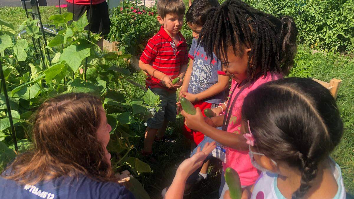 Shawanoe Elementary School Principal Abby Morgan shared the joy of discovery with pre-kindergarten students in mid-July after they harvested produce from a new learning garden, which the school won — along with a mobile cooking cart — in a contest sponsored by Price Chopper, the Captain Planet Foundation and Dole Packaged Foods.
