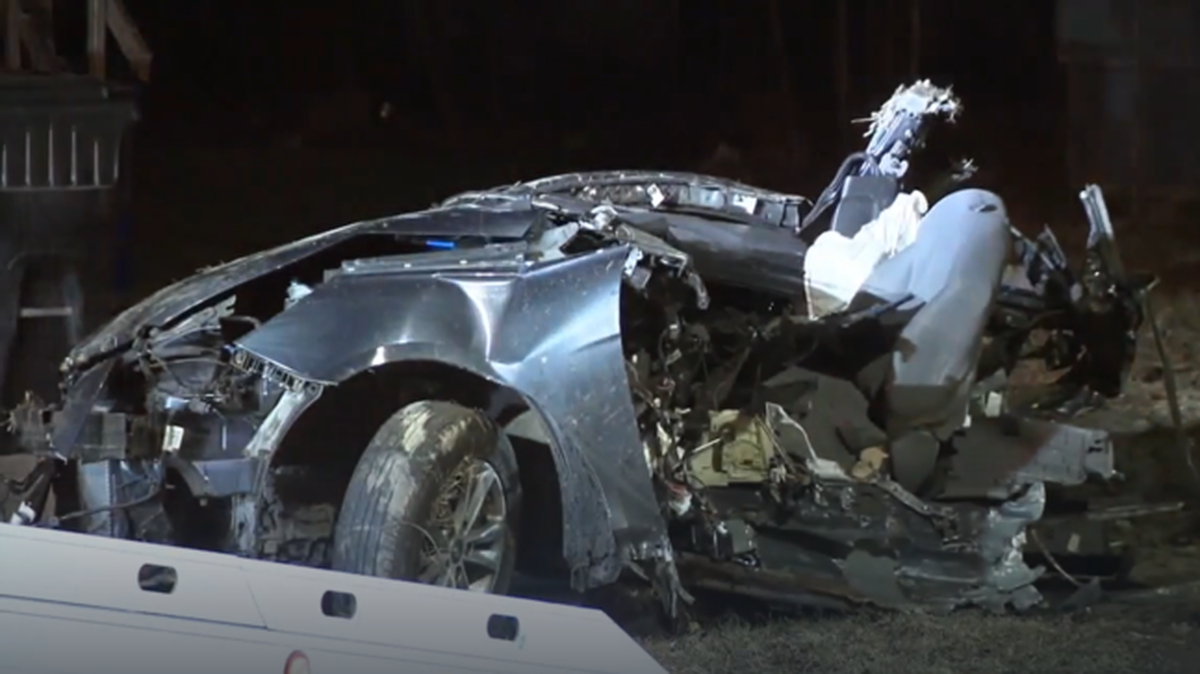 A screenshot of a video taken by WEWS, showing a tow truck removing the remains of a stolen vehicle that wrecked, killing three passengers and the driver, in Ohio on March 12.