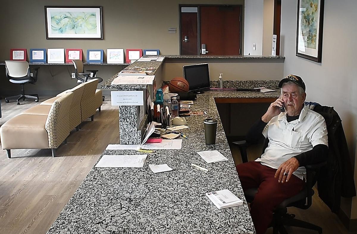 Army veteran Carl Yonkers volunteers every weekday answering the phone at St. Michael’s Veterans Center in Kansas City. For decades he struggled with post-traumatic stress disorder, hopping from place to place, and recognizing that homelessness takes many forms. Yonkers is a resident of St. Michael’s.