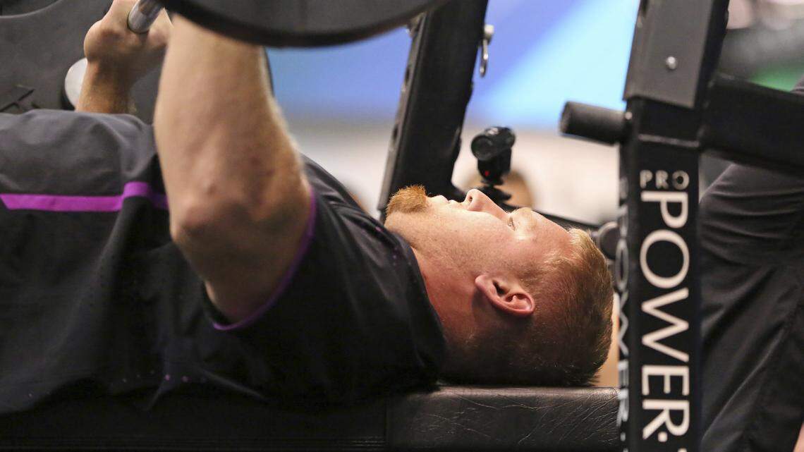 Offensive lineman Braden Smith competes in the bench press at the 2018 NFL football scouting combine Thursday, March 1, 2018, in Indianapolis. Smith made a donation to Autism for every rep.