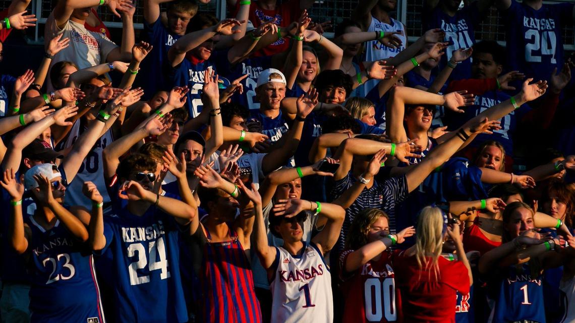 Kansas fans wave the wheat after a scoring drive during the game between the Kansas Jayhawks and Lindenwood Lions on Thursday, August 29, 2024 at Children’s Mercy Park in Kansas City, Kansas.