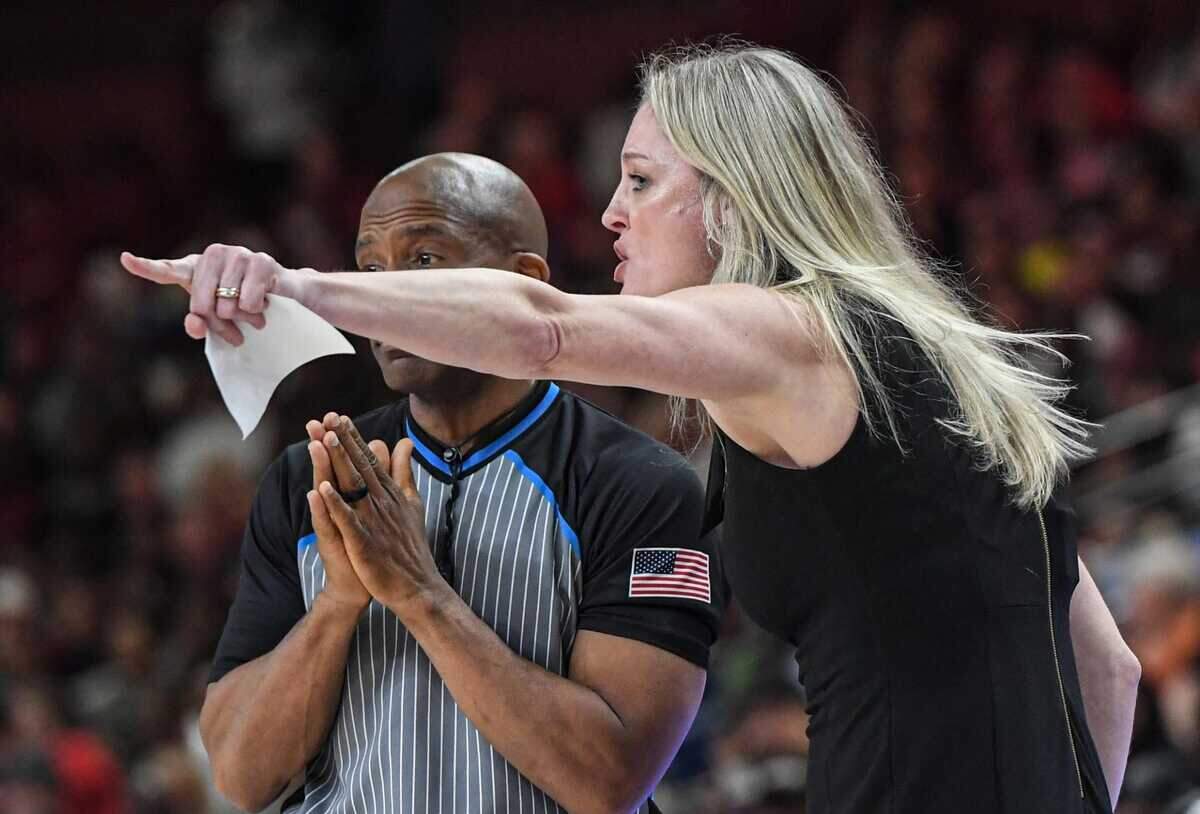 Kellie Harper chats with a referee during a 2024 SEC Tournament women’s basketball game between the Tennessee Vols (where she coached until last year) and South Carolina. Harper was hired as the next head coach of the Missouri Tigers on Tuesday, March 18, 2025.