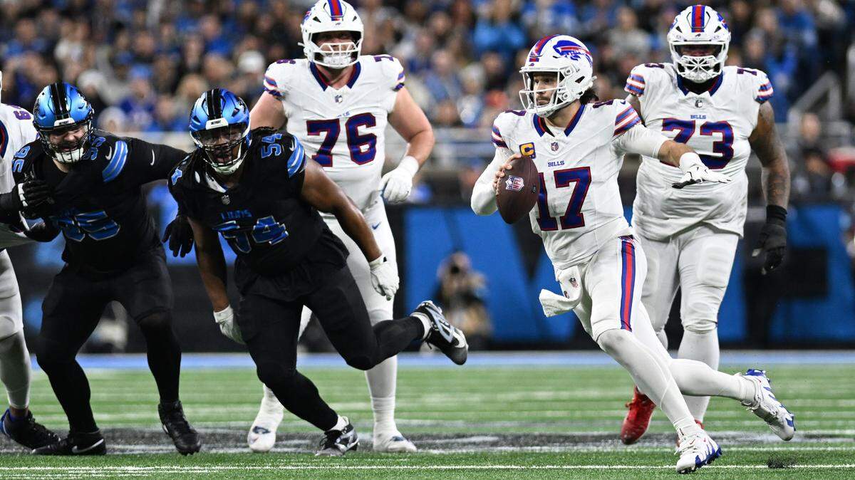 Dec 15, 2024; Detroit, Michigan, USA; Buffalo Bills quarterback Josh Allen (17) scrambles for a first down against the Detroit Lions in the first quarter at Ford Field. Mandatory Credit: Lon Horwedel-Imagn Images