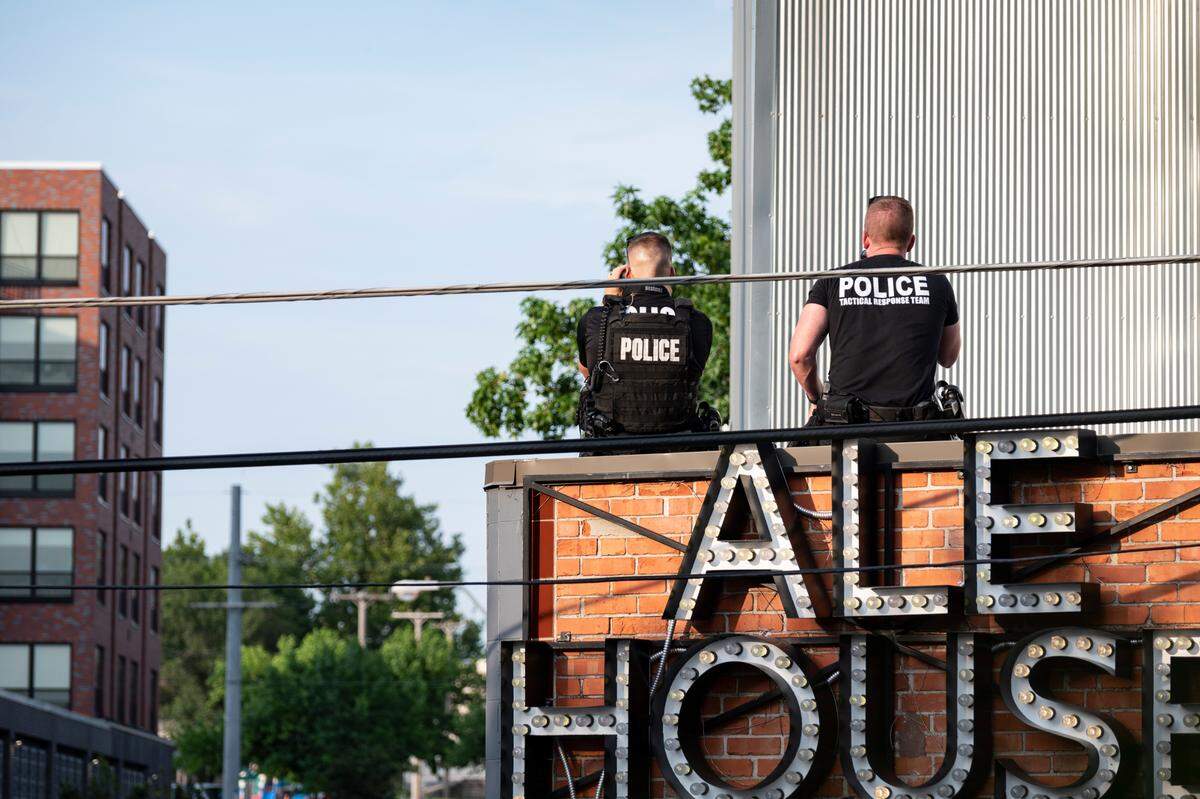 Kansas City Police Department snipers are engaged in a standoff at the 4100 block of Broadway Boulevard near Westport on July 1, 2022, in Kansas City.