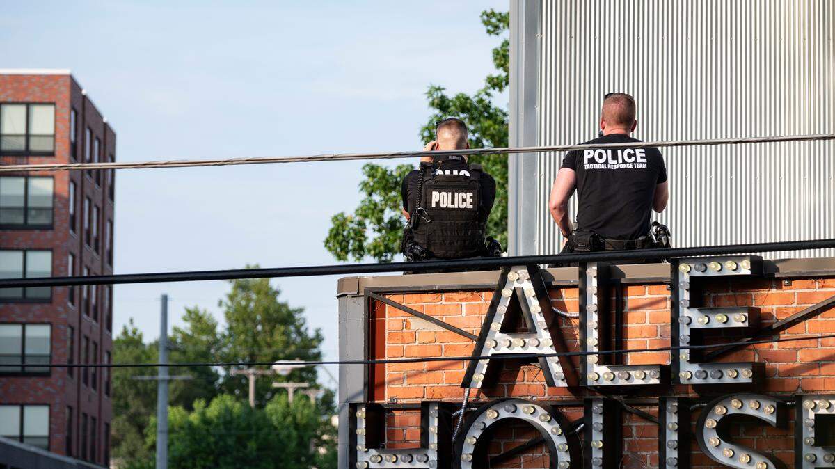 Kansas City Police Department snipers engaged in a standoff at the 4100 block of Broadway Boulevard near Westport on July 1, 2022, in Kansas City.