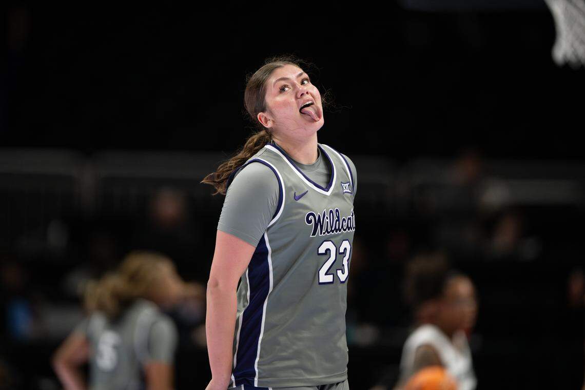 Kansas State Wildcats guard Jordan Speiser (23) sticks out her tongue after making a three-pointer against Oklahoma State during the Big 12 Women’s Basketball Tournament at the T-Mobile Center on Friday, March 6, 2026, in Kansas City, Missouri.