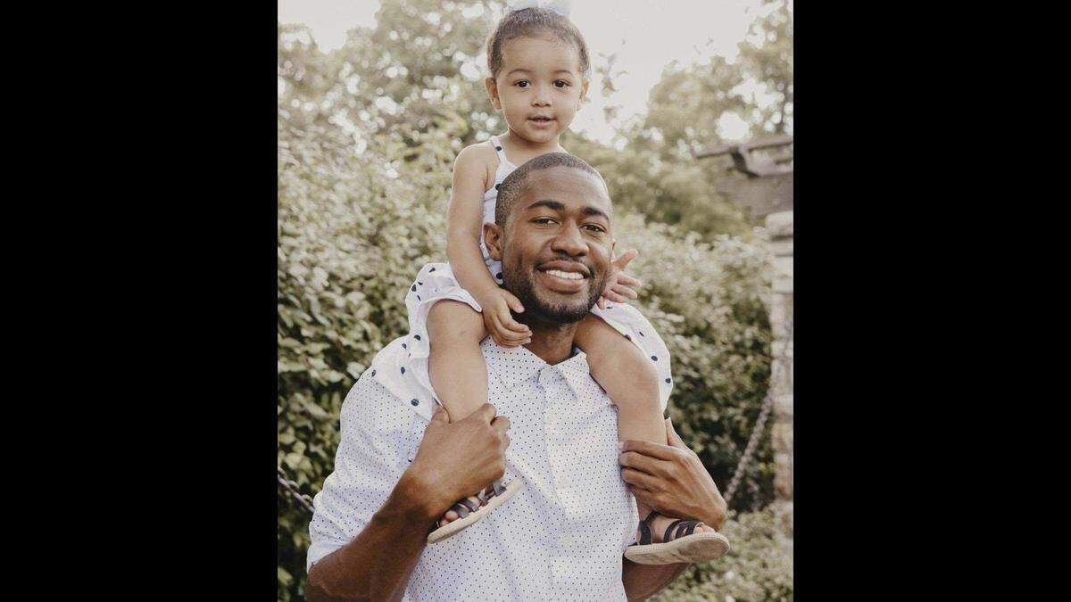In a family photo, Floyd Ross is pictured with his 3-year-old daughter Adrielle. Ross was shot and killed Tuesday night in Leavenworth.