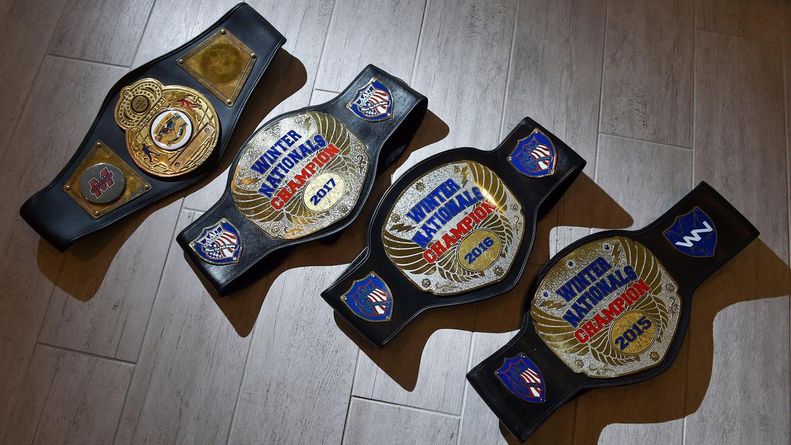 Cael Keck has earned several belts in wrestling competition.