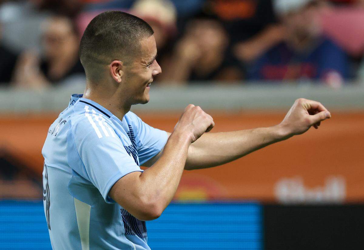 Sporting Kansas City forward Dejan Joveljic celebrates his goal against the Dynamo during a Major League Soccer match at Shell Energy Stadium in Houston on Saturday, May 31, 2025.