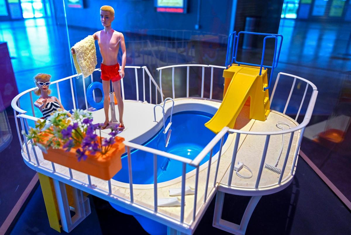 Vinatage Barbie and Ken in the 1980 dream pool on display for Barbie fans to see at Union Station.