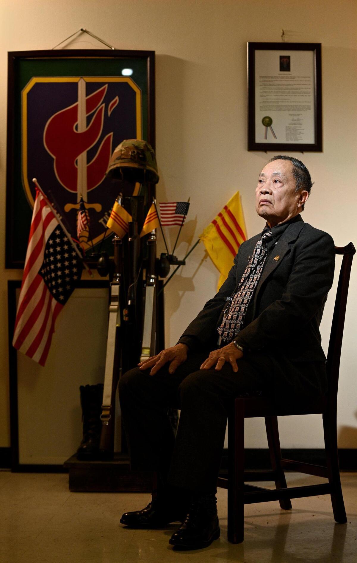 Ty Bui in his office surrounded by memorabilia from his time in Vietnam. A former South Vietnam Navy captain, Bui fled to South Korea in a boat with 200 people that almost capsized. When he arrived in Kansas City in 1976, alone, he began volunteering to help other refugees at Don Bosco at the age of 27. He was director of the center’s refugee program for 36 years.