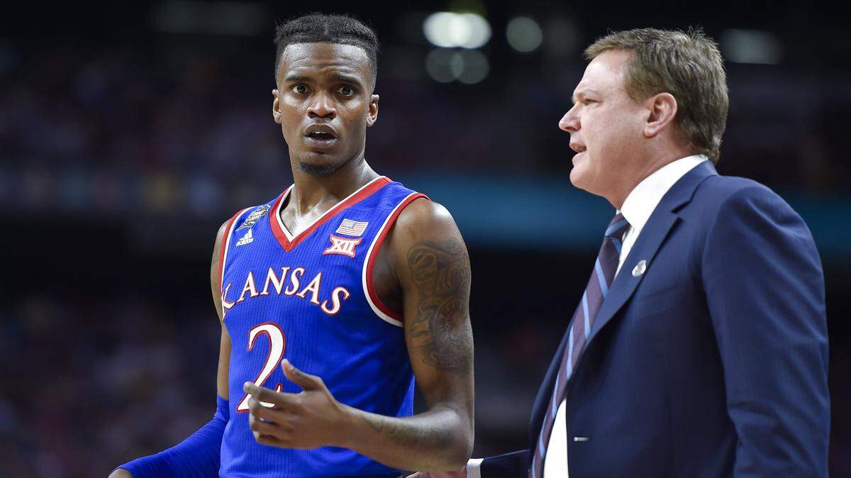 Lagerald Vick (left) is returning for his senior season at Kansas.