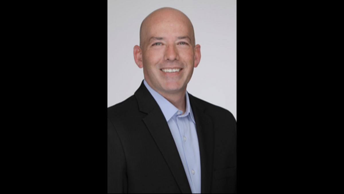 Robert Kuhn, an incumbent, is running for the Olathe school board.