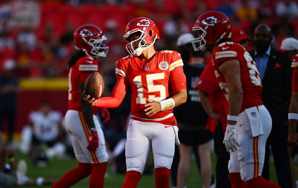 Kansas City Chiefs quarterback Patrick Mahomes (15) warms up before the preseason game with the Chicago Bears on Friday, Aug. 22, 2025, at GEHA Field at Arrowhead Stadium.