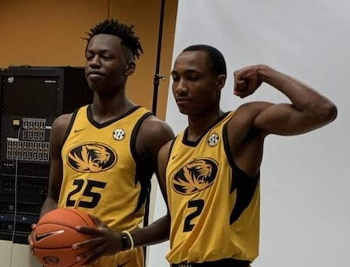 Missouri men’s basketball players and Kansas City products Mark Mitchell, left, and Tamar Bates pose for photos during a recruiting trip to Columbia, before they became Tigers.