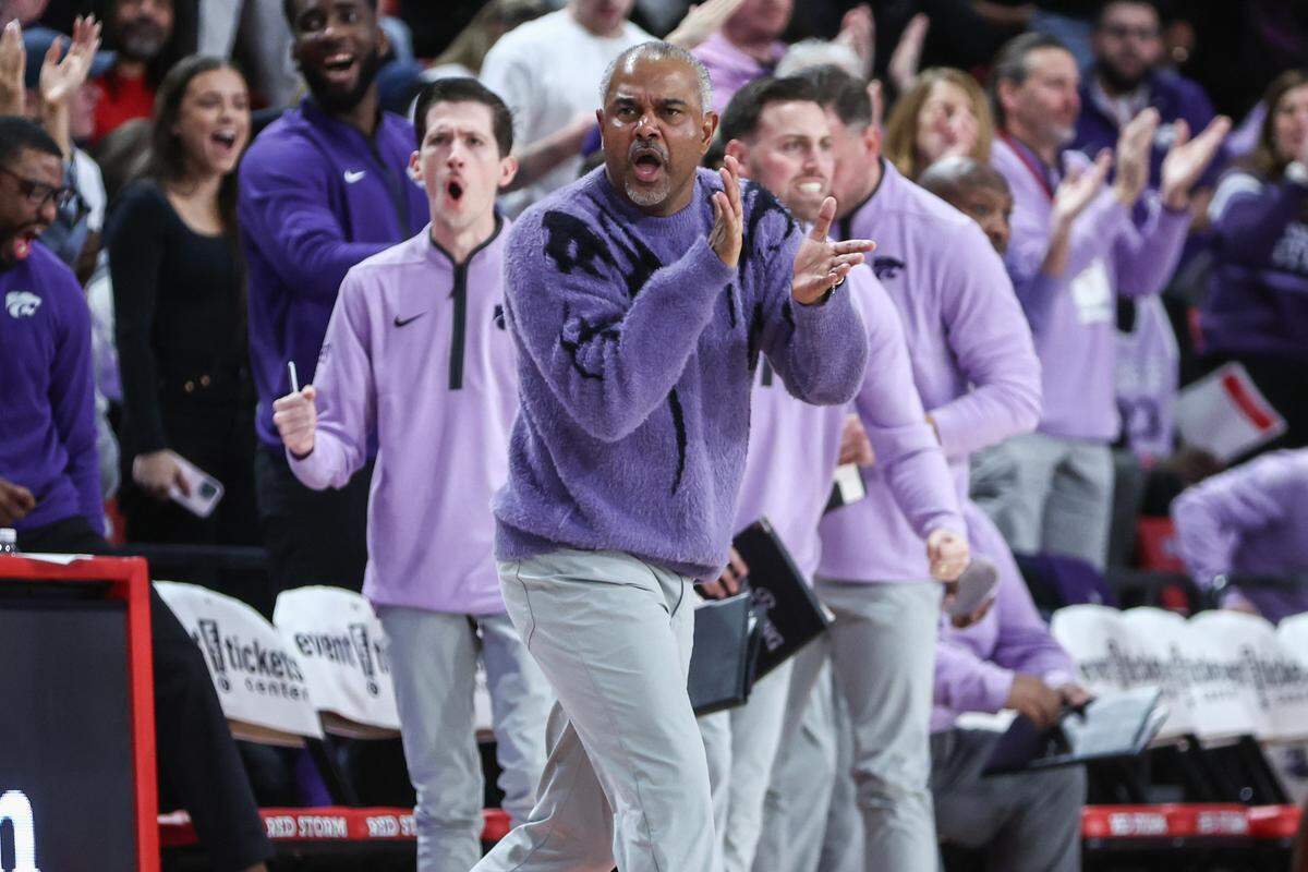 Kansas State Wildcats coach Jerome Tang cheers on his squad during a Saturday, Dec 7, 2024 college basketball game against the St. John’s Red Storm at Carnesecca Arena in Queens, New York.