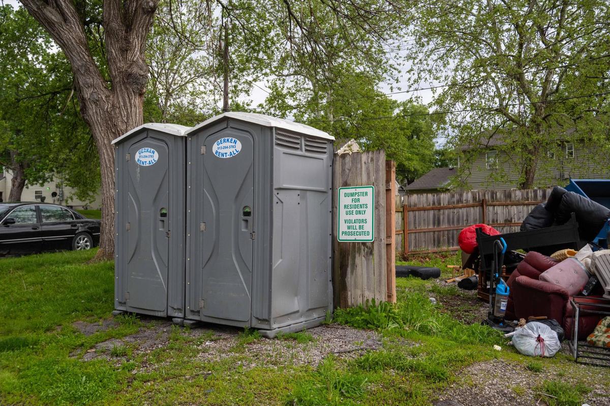Portable toilets were set i[ at Aspen Place Apartments in Gardner on Wednesday, May 7, 2025. Residents were forced to use the “portapotties” whenever the water system failed in the complex, which residents say was often. Residents of the apartment complex were forced from their homes after the city condemned the property due to several safety concerns.