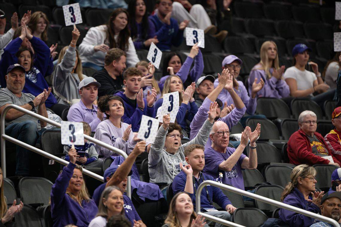 The Kansas State Wildcat fanbase celebrates a three-point basket against Oklahoma State during the Big 12 Women’s Basketball Tournament.