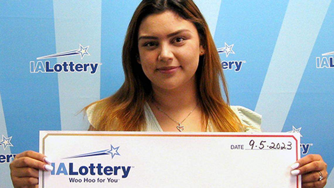 Alexandra Perez-Gonzalez with her oversized check.