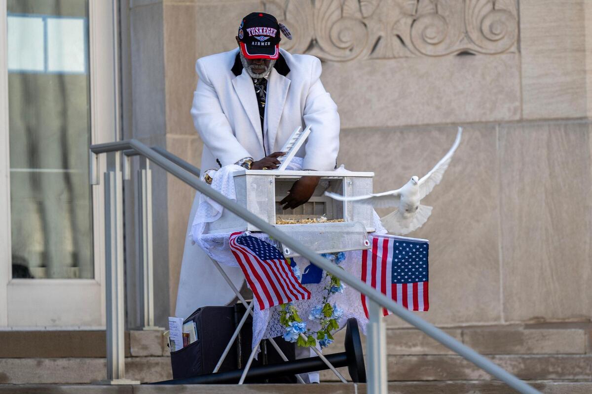 White doves were released during a memorial service for Drexel Mack, a civil process officer with Jackson County courts who was shot and killed during an eviction, at the Jackson County Courthouse on Monday, March 11, 2024, in Kansas City.