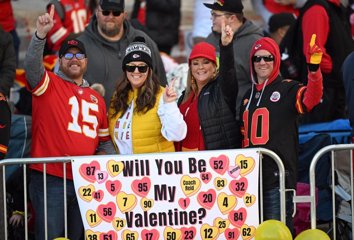 Chiefs fans have a Valentine’s message for all of the Chiefs players before the Kansas City Chiefs Super Bowl LVIII victory parade Wednesday, Feb. 14, 2024, in Kansas City.