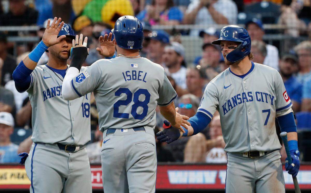 Kansas City Royals first baseman Yuli Gurriel, left, and shortstop Bobby Witt Jr., right, greet center fielder Kyle Isbel as he crosses home plate during Friday’s game against the Pittsburgh Pirates at PNC Park.