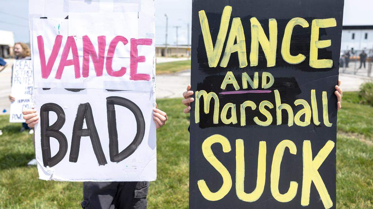A small group of protesters gathered near Milbank Manufacturing, the site of Vice President JD Vance’s visit to Kansas City, on Monday, May 18.