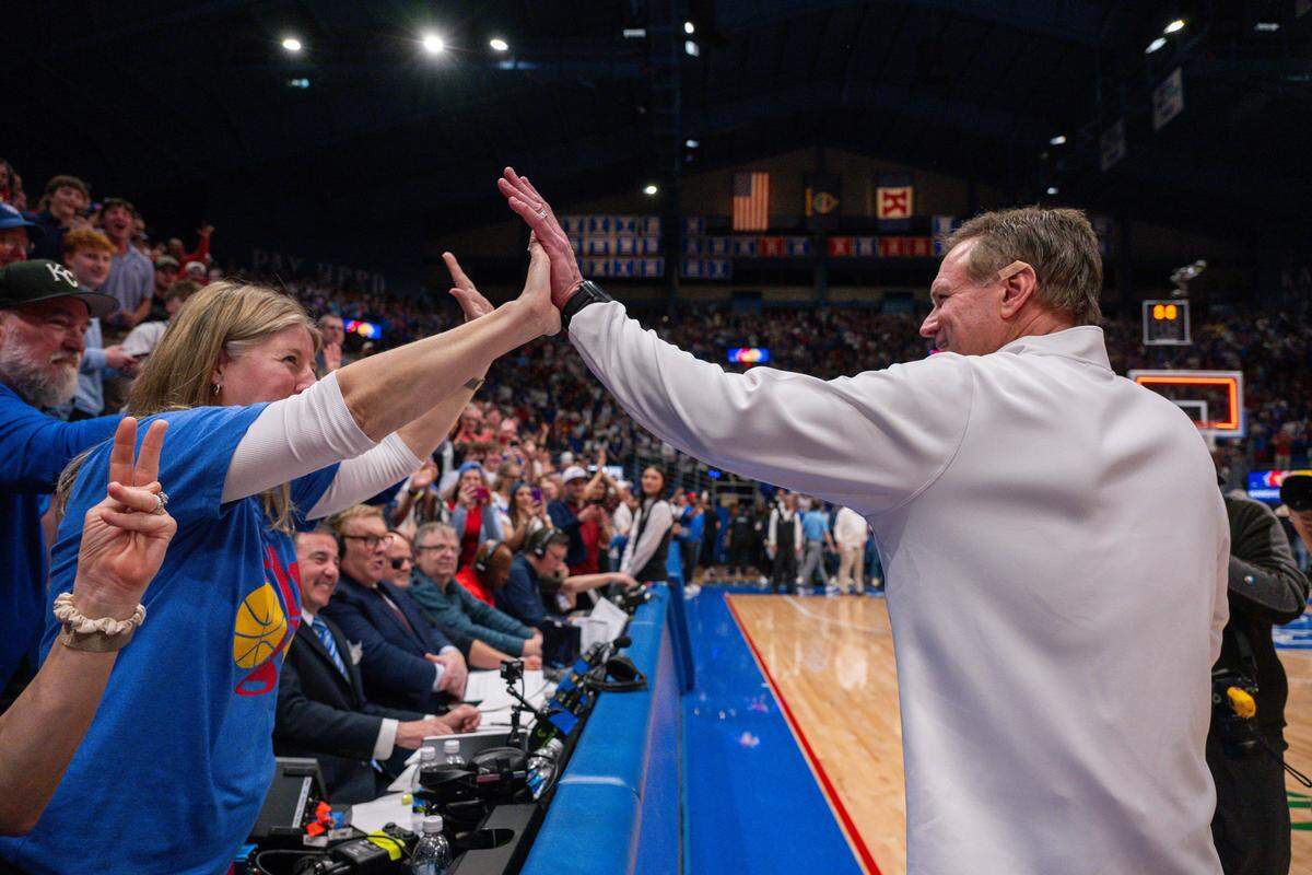Kansas Jayhawks head coach Bill Self gives high-fives to fans following the win vs. the Arizona Wildcats on Monday, February 9, 2026, at Allen Fieldhouse.