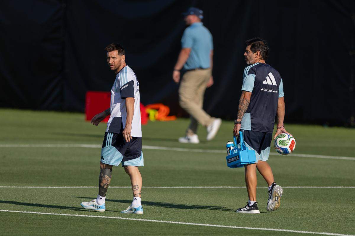 Forward Lionel Messi, No. 10, works with a medical trainer during team Argentina's third practice in Kansas City, Kansas, on Wednesday, June 3, 2026.