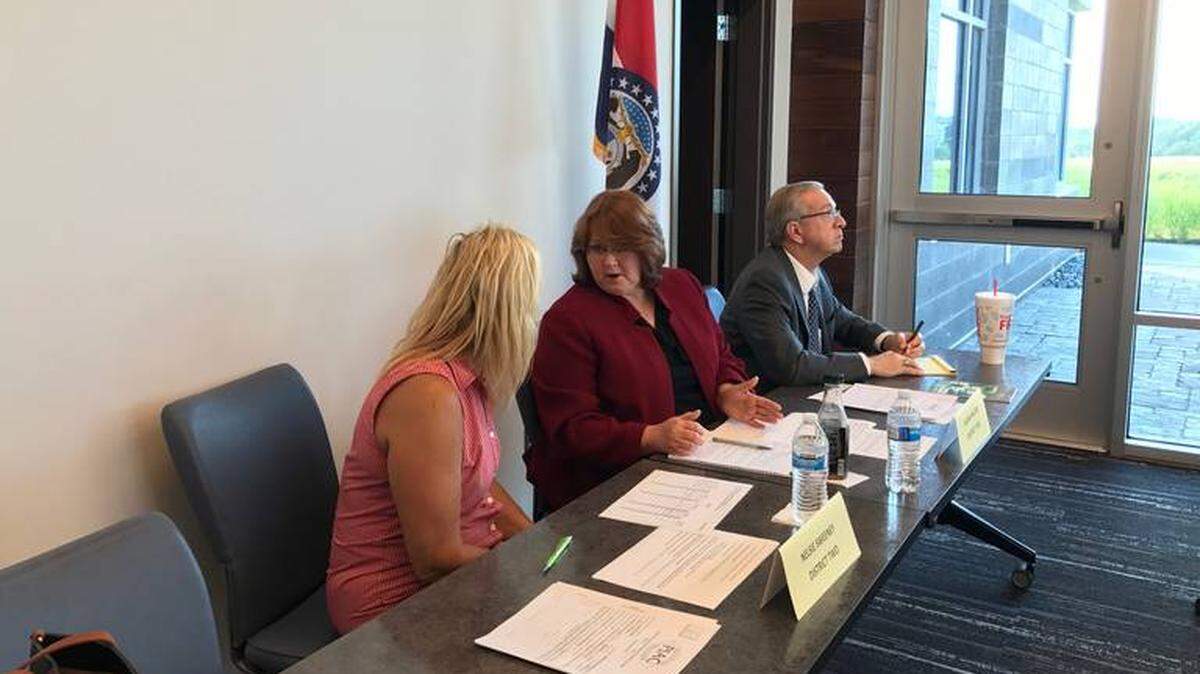 Valerie McCaw (center) sits on the city's Public Improvements Advisory Committee.