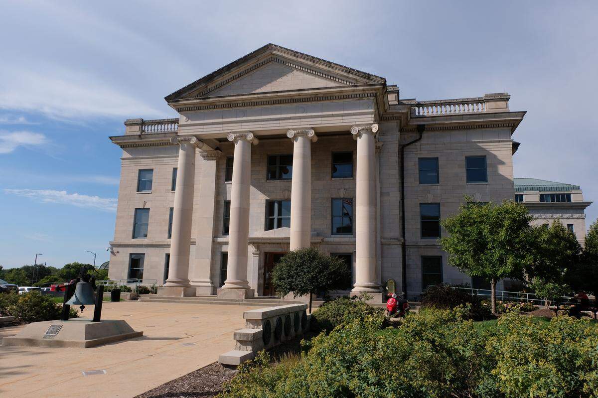 At the Boone County Courthouse in Columbia, defendants on a wait list must appear in court regularly as they await a public defender to become available to take their case.