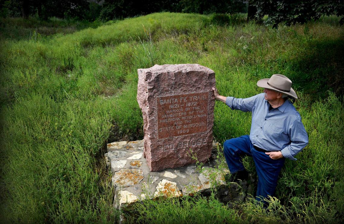 Historian Gene Chavez visits a historical marker in south Kansas City’s Minor Park. It’s in the middle of a large swale from the Santa Fe Trail, where thousands of wagons struggled up an incline after crossing the Blue River.