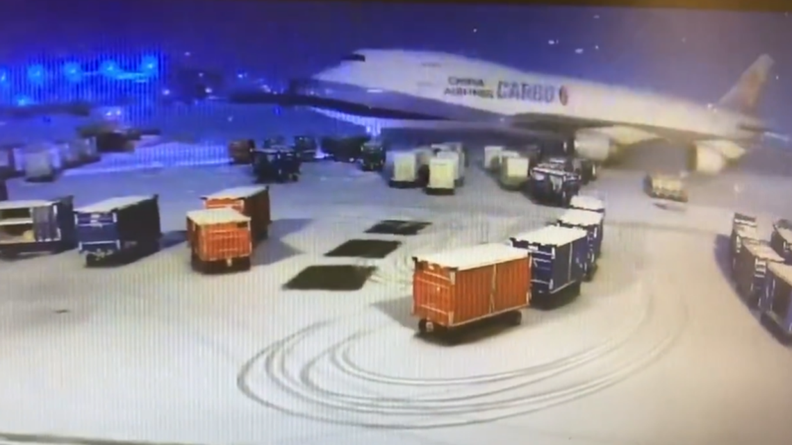 A China Airlines plane collided with baggage carts during a snowstorm at Chicago O’Hare Airport.