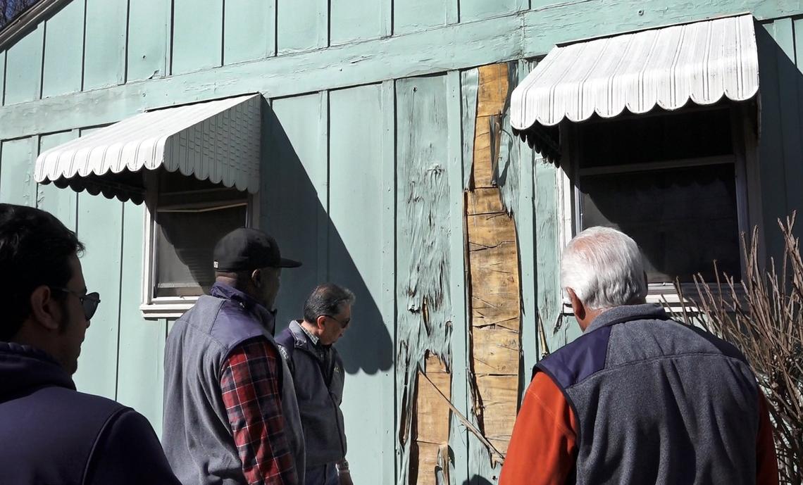 Contractors with the Lead Safe KC program recently inspected the home of Freddie Slaughter near 60th Street and the Paseo to help with making bids for lead-based paint abatement.