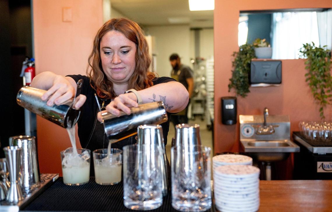 Madeline Buechter mixes a pair of margaritas at Barbacoa.