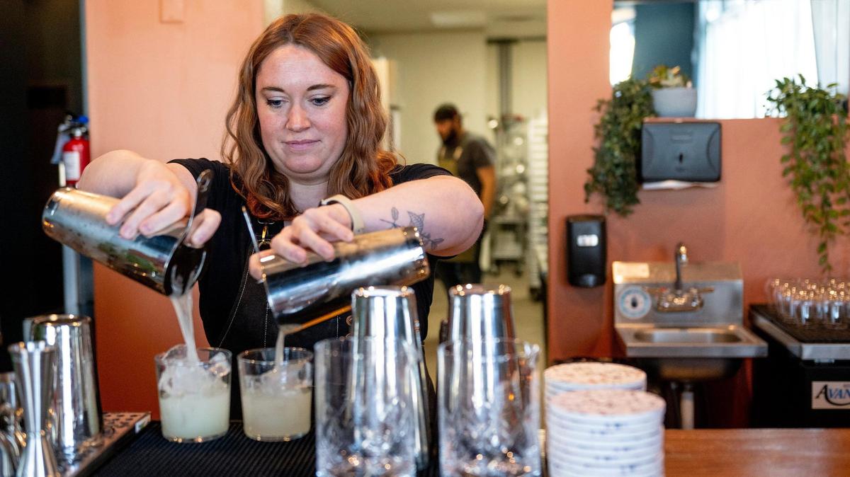 Madeline Buechter mixes a pair of margaritas at Barbacoa.