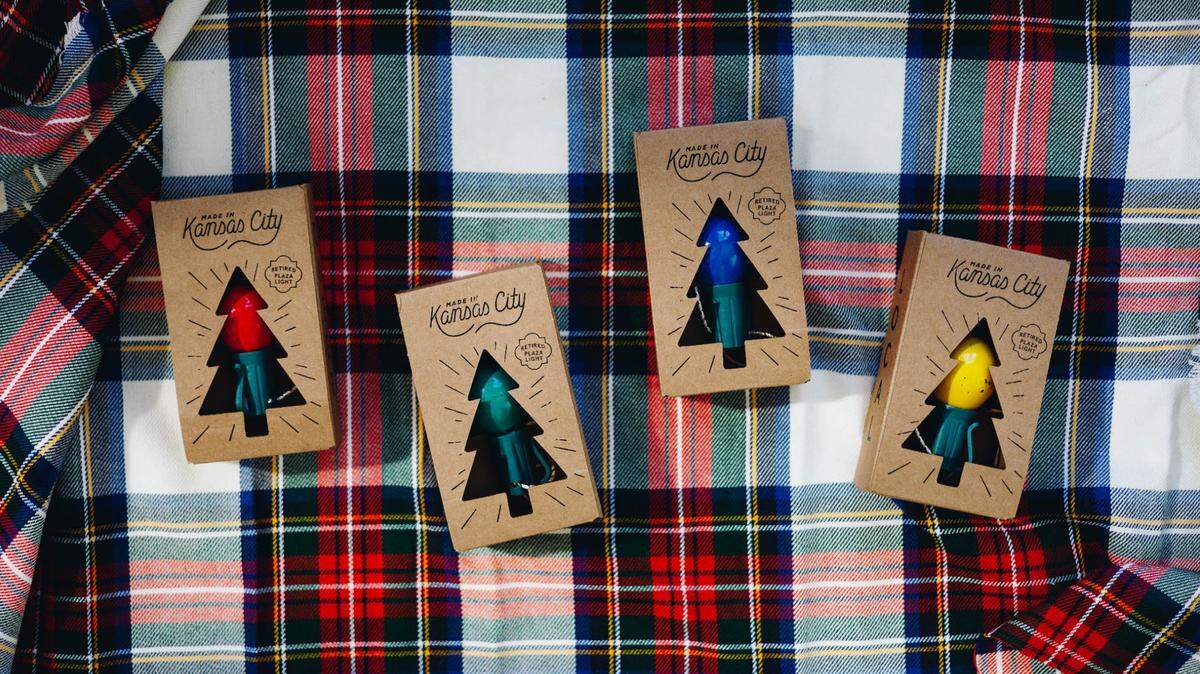 Plaza Lightbulb ornaments allow Kansas Citians to hang a real Country Club Plaza holiday lightbulb on their own tree. The ornaments are available at Made in Kansas City, a marketplace for locally made goods with ten locations around the metro.