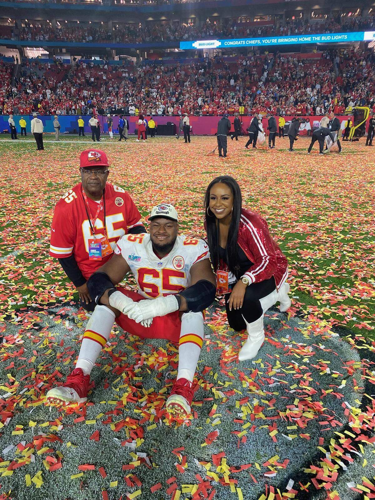 Kansas City Chiefs offensive lineman Trey Smith is flanked by his father, Henry, and sister, Ashley, after winning Super Bowl LVII against the Philadelphia Eagles.